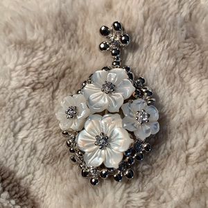 Sterling silver, cz and mother of pearl flower pendant